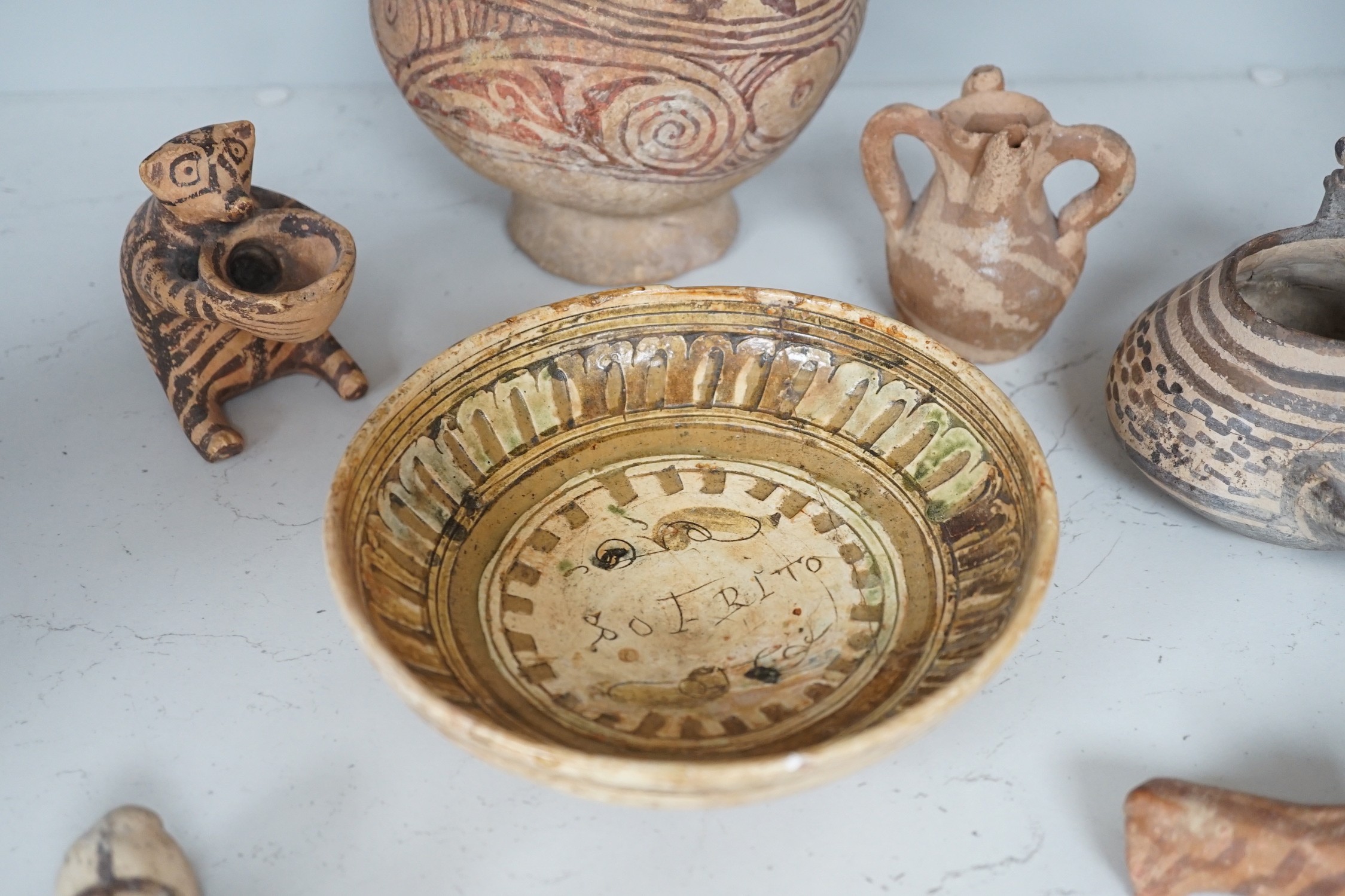 A selection of early Pre-Colombian, and other ceramics, to include an unusual vessel. Tallest 26cm